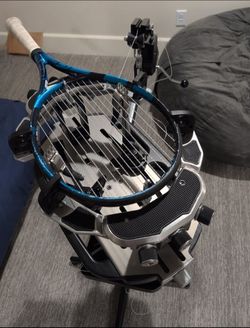 Tennis racket stringing