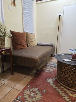 Brown Upholstered leather Daybed with Turned Legs