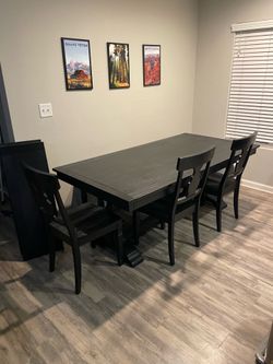 Large dining table with bench and chairs