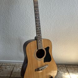 Ibanez acoustic guitar with stand
