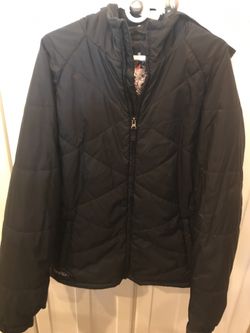 Burton’s Women”s ski jacket FR: REI