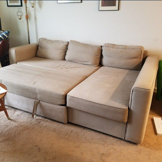 Sectional sofabed with storage
