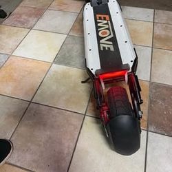 EMOVE Cruiser V2 – 52V Quad Suspension 62-Mile Long-Range Scooter