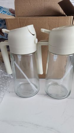 2 oil dispensers