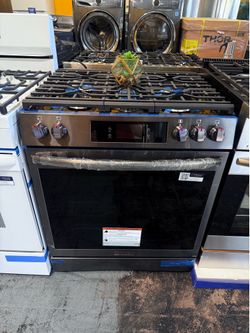 Frigidaire black stainless steel stove no credit needed