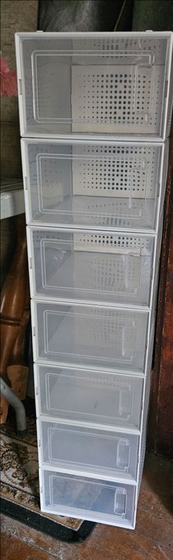 7 clear plastic stackable shoe organizer features drop-front doors for easy access.