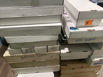 75,000 Baseball, Basketball and Football cards.
