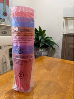 12 colorful plastic cups, NEW- sealed in packaging. Unbreakable