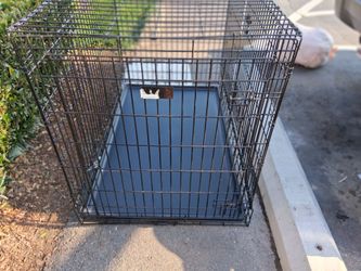 Midwest 2 door dog crate.            48 " -  L,   30"  -   H,   35"  -  W.        $75