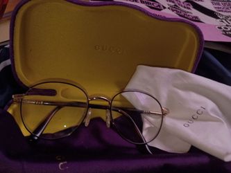 GUCCI eyeglasses frame with case GG0392O