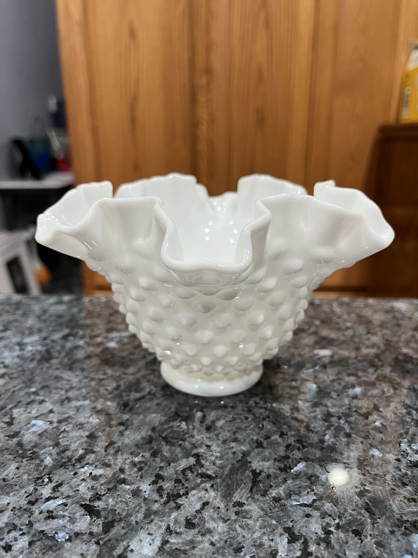 Vintage Fenton White Milk Glass Hobnail Bowl Ruffled Crimped a design. Size approximately 4 inches tall and 6 1/2 inches wide. Preowned good conditi