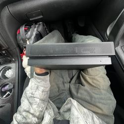 The Xbox One X, released in 2017 as a high-end, 4K-capable console, offers 6 teraflops of graphical power, 12GB GDDR5 RAM, and a 4K Blu-ray player