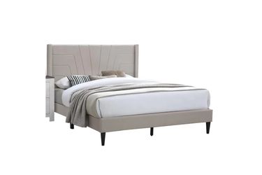 Beige queen size bed with mattress