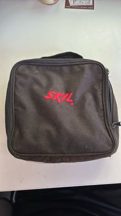 Skil- Drill with bag