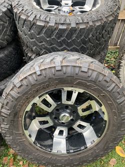 Mud tires with rims 35/{link removed}