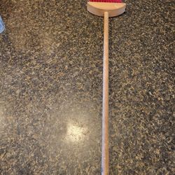 Small wood broom red bristles