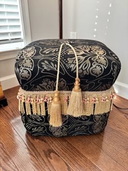 Upholstered Ottoman with Tassel Fringe Trim