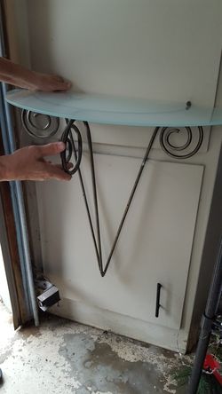 Wall mounted metal and glass,table