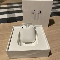 Used Apple AirPods Generation 2 with Wireless Charging Case. 