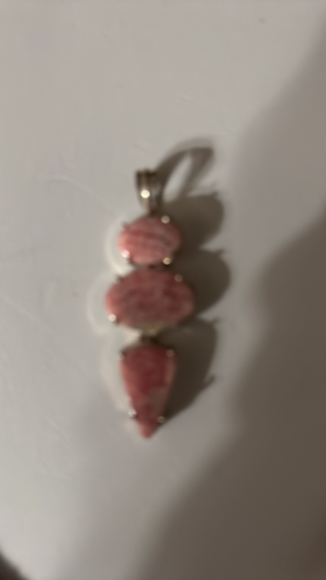 Beautiful hues of manganese pink rhodochrosite pendant