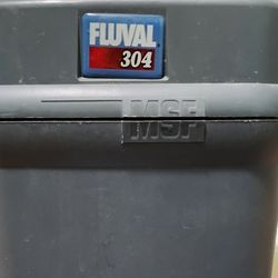 Fluval 304 Filtration Pump And 55 Gallon Fish Tank With stand.