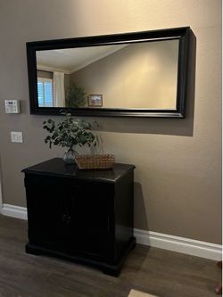 Large black wall mirror