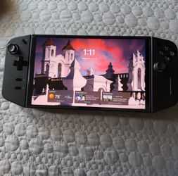 Legion Go 8.8" 144Hz WQXGA Gaming Handheld - AMD Ryzen Z1 Extreme - 16GB with 1 TB SSD plus 1tb SANDISK 1TB Extreme microSDXC UHS-I Memory Card
