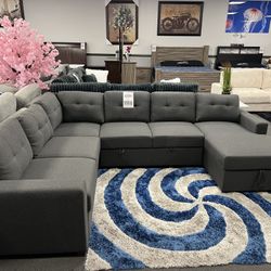 Dark Gray Sofa Sectional w/ Pull- Out Sleeper & Storage In Chaise 