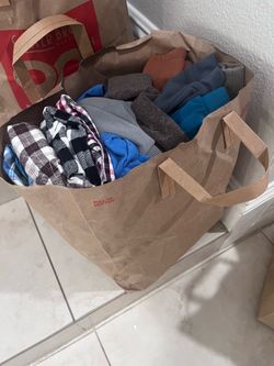 Bag full of baby boy clothes