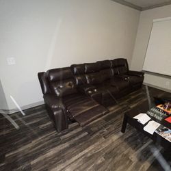 3 Piece Brown Sectional Sofa with cup holders.  Manual reclining sections.