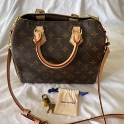 Louis Vuitton - Speedy Bandouliere 