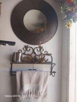 “Bathroom Decor Set – Mirror & Towel Rack – $30”.