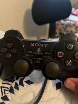 PlayStation DualShock 2 controller. Offers