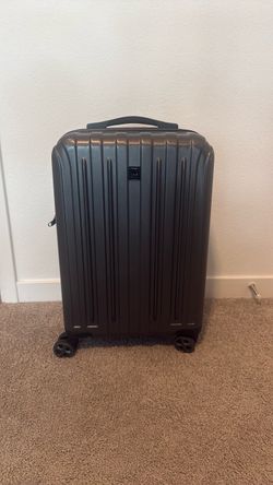 Delsey Hard Shell Spinner Luggage