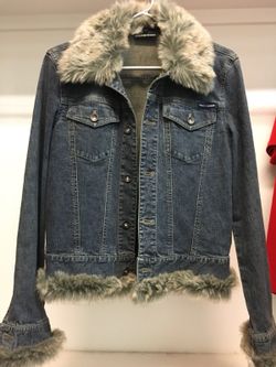 Brand new stretched jDKNY JEANS JACKET with tag attached . Size medium. Great holiday gift .