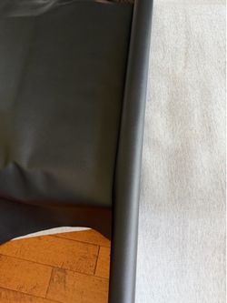 4.6 yards of Smooth black faux leather material.