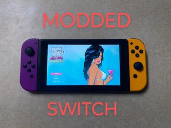 NINTENDO SWITCH with 125 SWITCH GAMES and 7500 CLASSIC GAMES