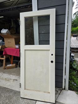 Used 32x86 solid wooden doorway glass.