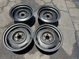 Staggered Mopar small pattern 15 inch steelies 5 on 4