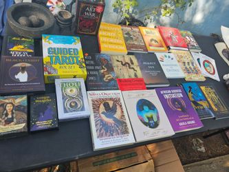 Will sell seperate or together. Whole table will make great deal. Tarot sets and books and more. Off