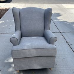 Gray Cushioned Rocking Chair