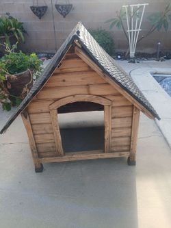 Wooden dog house