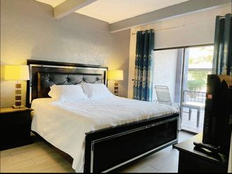 Black King Bed Frame with Tufted Headboard