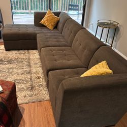 9 Seat Gray Convertible Couch (ottoman)