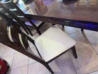 Real Wood Dinning Table. Has 2 Extenders For The Table. Chairs Included Have Been reupholstered, , I Have The Matching Bar Chairs.