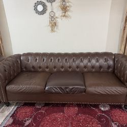 Two Brown Couches