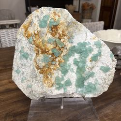 Large raw cubic fluorite on the matrix with stand