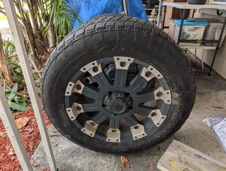 2 TOYOTA CUSTOM RIMS w/20" All Terrain Tires