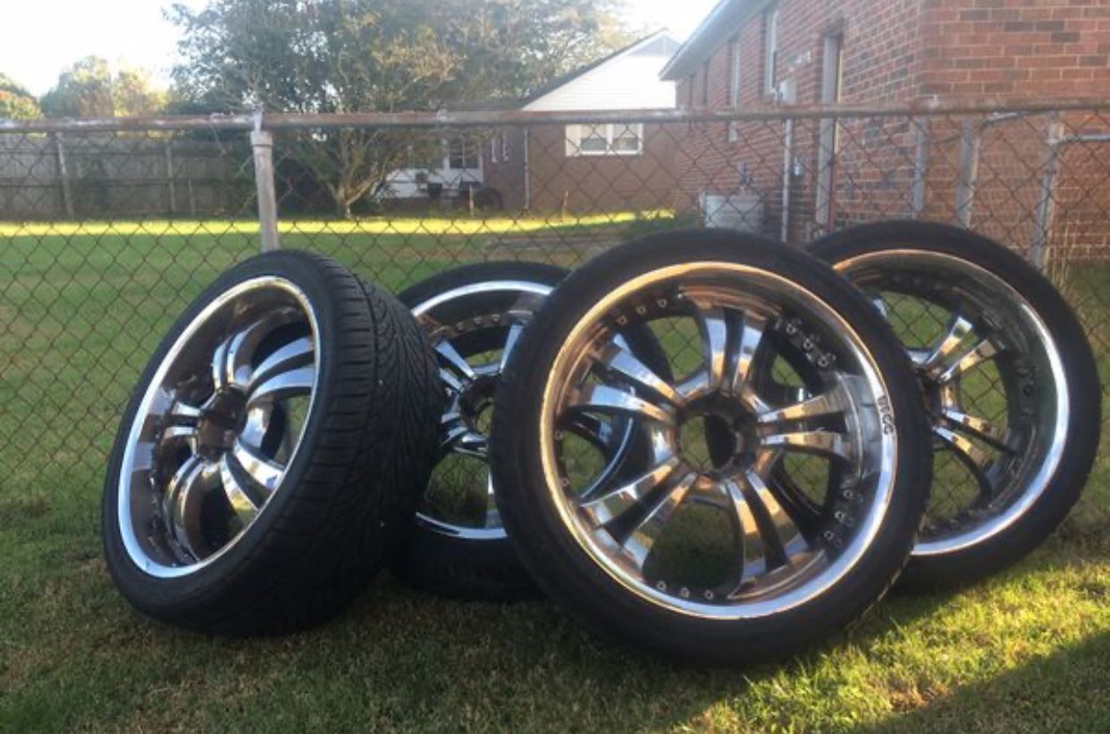 24inch Chrome BIGG rims with 295/35/24 inch tires with 60% thread and 6 lugs