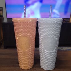 2-24 OZ STARBUCKS CUPS WITH TOP CAP AND STRAW. WHITE CUP HAS A MINT COLOR GREEN INSIDE. 